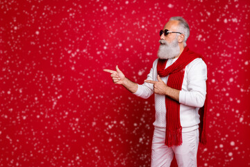 Portrait of his he nice attractive handsome confident classy gray-haired man demonstrating copy space ad advert solution decision black Friday isolated over bright vivid shine red background