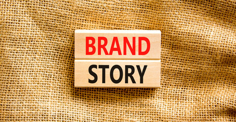 Brand story symbol. Concept words Brand story on beautiful wooden blocks. Beautiful canvas background. Business brand story concept. Copy space.