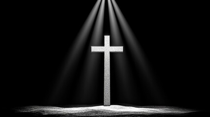 Evocative Black and White Image of a Cross Illuminated by Light Rays