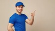 © Andrii - Cheerful Delivery Personnel In Blue Cap And T-Shirt Uniform Pointing Finger To Indicate Area On Beige Background. Service Concept.