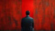 © Tyoma - A man in a suit is sitting in front of a red wall with a red line