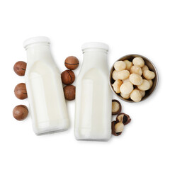 Wall Mural - Bottles of macadamia milk and nuts isolated on white, top view