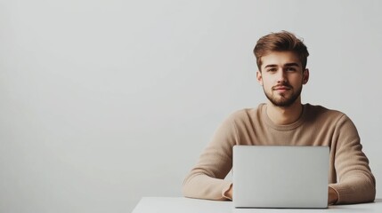 Leinwandbilder - A freelancer man concentrates on his laptop, showcasing remote work in a clean and modern environment. Generative AI
