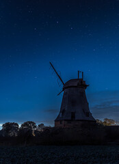 old dutch windmill at night