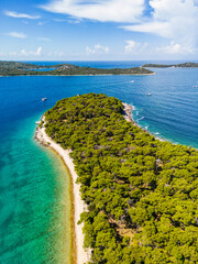 Canvas Print - Aerial view of wonderful, green peninsula and white beaches with islands on the horizon at the Rogoznica archipelago, Croatia