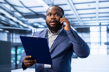 Poster - manager maintaining accurate documentation of data center infrastructure, participating in phone cal