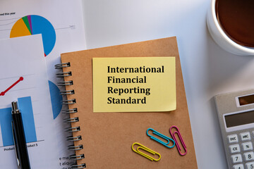 There is sticky note with the word International Financial Reporting Standard. It is as an eye-catching image.