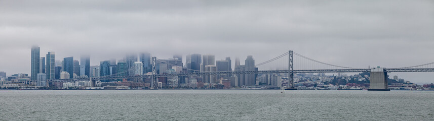 Wall Mural - Pano of San Francisco Skyline with Bay Bridge on a Cloudy Day