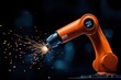 © JK_kyoto - Industrial robotic arm welding with sparks on a dark background.