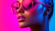 © Andrii Savchuk - Portrait of a woman with glowing neon pink glasses