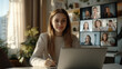 © Morninghead - young woman participates in video call, engaging with her team remotely
