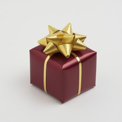 Small Christmas gift in red wrapping with gold bow, white background