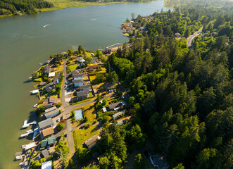 Wall Mural - A view of a small town with houses and a lake