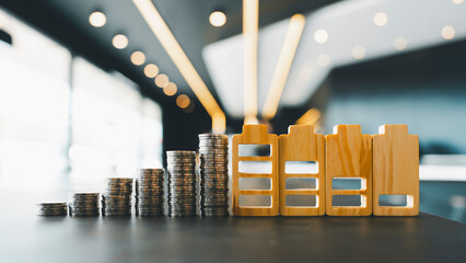 A pile of coins and an electricity symbol, it is a concept of electricity production having higher costs, causing the expenses of the people who have to pay for electricity to increase as well.