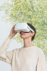 Aufkleber - Woman Using Virtual Reality Headset for Outdoor Simulation in a Natural Setting