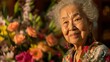 © KerXing - Joyful elderly woman with flowers, capturing happiness and serenity.