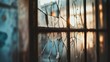© 성환 이 - A selective focus on a cracked windowpane in an old, abandoned building, with the surrounding structure blurred