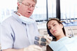 © peopleimages.com - Man, dentist and patient with x ray scan for teeth growth, dental implant and treatment planning of health. Mature, orthodontics and woman with mouth assessment, diagnosis results and hygiene advice