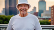 © QuoDesign - Senior man wearing white t-shirt and white bucket hat standing on cityscape background