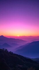 Poster - A beautiful sunset over a mountain range with a purple sky