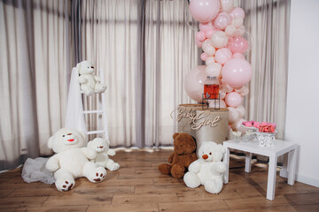 Baby shower photo zone luxury pink and white in the room of the house. Waiting for the birth of a girl.