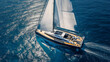 © RAT-GSJ - Sailboat Gliding Over Calm Blue Sea