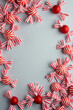 © Galeno - red striped candy forms festive holiday decor amidst gray background