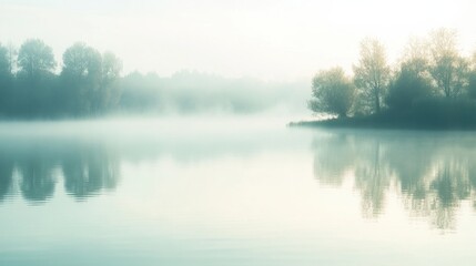 Aufkleber - the calm lake is enveloped in gentle mist, reflecting trees and soft morning light, evoking a serene