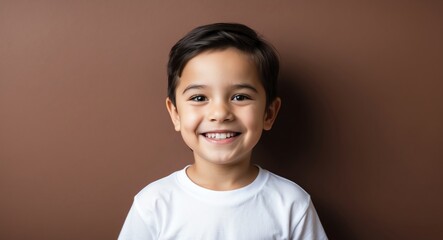 caucasian kid boy brown background wearing plain white tshirt smiling happy portrait