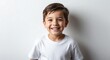 © Arceli - caucasian kid boy white background wearing plain white tshirt smiling happy portrait