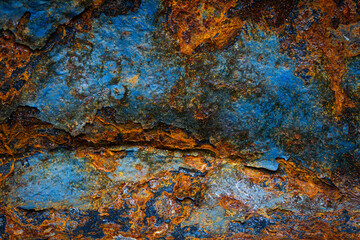 Wall Mural - Rusty metal surface with shabby background paint. Blue cracked paint texture on an iron sheet. Fragment of an old metal door, Metal corrosion.