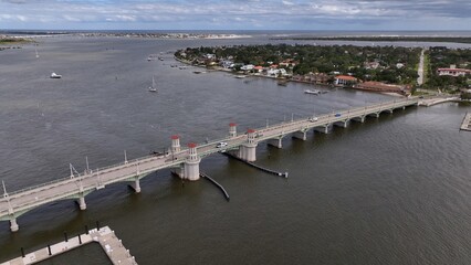 St Augustine Florida aerial view of historic Bridge Of Lions crossing inlet waterway with cars traveling 