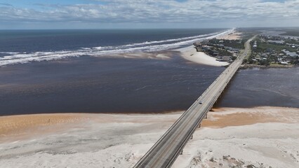 Travel by the Florida coastline on A1A scenic byway passing through St Augustine Beach by coastal homes by beautiful beaches and waterways