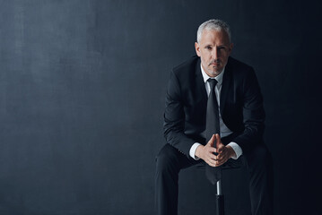 Poster - Mockup space, serious and portrait of businessman in studio with confidence for legal career. Pride, law firm and mature male attorney executive from New York with corporate job by black background.