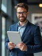 © Ol - young business engineer with tablet medium shot