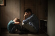 © kieferpix - Sad father and child at home, family loss, divorce
