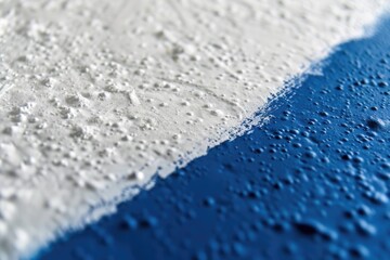 Close-up shot of a blue and white textured surface