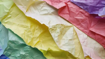 Poster - A collection of crumpled tissue paper in various pastel colors is arranged in an artistic manner, perfect for arts and crafts projects. The textures and hues add warmth to creative endeavors.