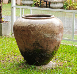 Antique earthenware jar in the garden