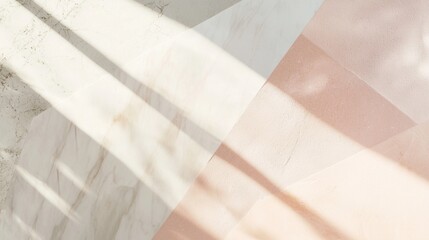 Poster - Sunlight is casting shadows on a surface composed of marble and pink concrete sections, creating an abstract geometric design with contrasting textures and soft pastel colors