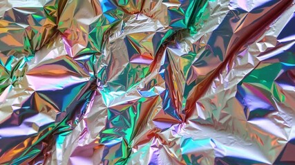 Aufkleber - The surface displays a striking array of iridescent colors, reflecting light in various hues. The crinkled texture adds depth and visual interest to the vibrant composition.