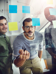Aufkleber - Business men, writing or schedule planning with glass board for meeting, brainstorming or reminder at office. Young, group or employees taking notes for agenda, tasks or project ideas at workplace