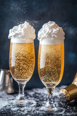 Wall Mural - Sparkling cream soda in elegant glasses topped with whipped foam creates refreshing and delightful drink experience. Perfect for celebrations or casual gatherings