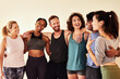 © peopleimages.com - People, hug and happy in yoga class for teamwork, discussion and bonding together with diversity. Group, support and embrace in studio for spiritual conversation, exercise and fitness with friends