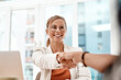 © peopleimages.com - Happy, business woman and handshake with meeting for b2b, partnership or agreement at office. Young, female person or employee shaking hands with colleague for promotion, hiring or deal at workplace