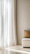 © JuanM - Bright and airy living room corner with sheer curtains and a cozy cushion in natural light