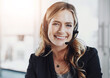 © peopleimages.com - Woman, callcenter and smile in portrait, contact us with communication and CRM, mockup space and headset. Customer service, phone call and happy female consultant on help desk with support in office