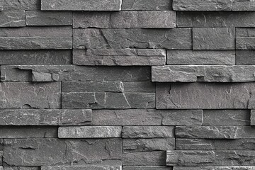 Grey slate stone wall texture, perfect for backgrounds and design projects.