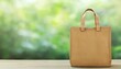 © PrusarooYakk - Stylish tote bag on natural background