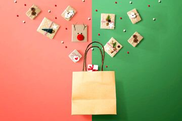 Wall Mural - Christmas gift boxes with a shopping bag - overhead view flat lay